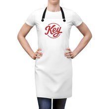 Load image into Gallery viewer, Key Logo Apron — White Kitchen Apron with Red Script Logo